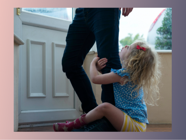 child holding onto parent