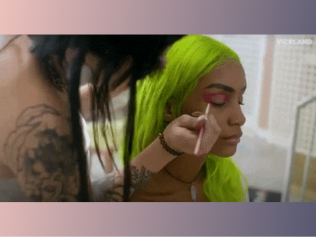 makeup artist applying makeup